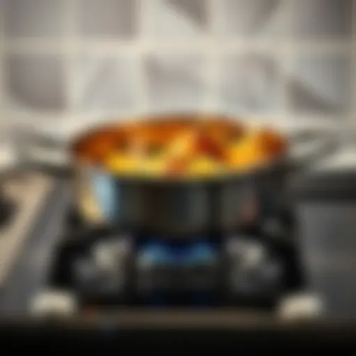 A stainless steel Demeyere pan on a stove with food cooking inside