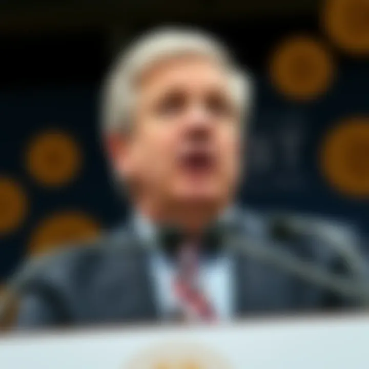 JPMorgan CEO Jamie Dimon speaking at a press conference, facing criticism for his remarks on cryptocurrency, with Bitcoin symbols in the background.