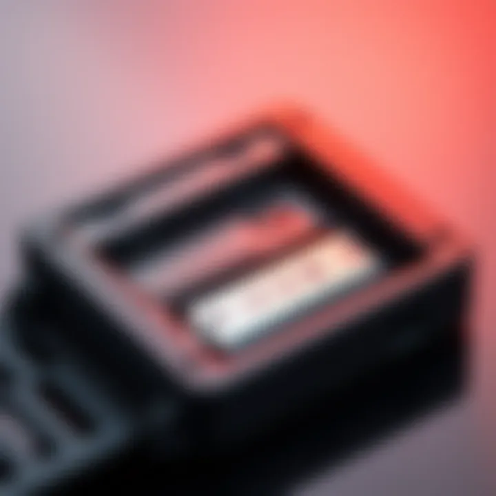 A close-up view of a Ledger Nano X that has been tampered with to include a tracking device inside, showing a smaller battery beside the original design.