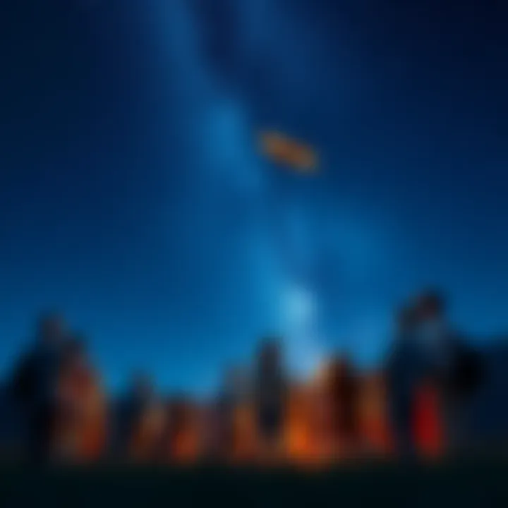 A group of people gathered outside under a clear starry sky, sharing stories and enjoying the view of the stars.