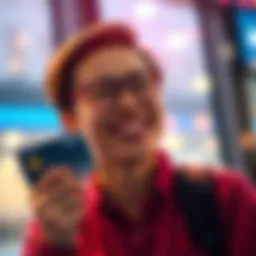 A person smiling while holding a credit card, symbolizing Revolut's decision to reimburse fees for customers.