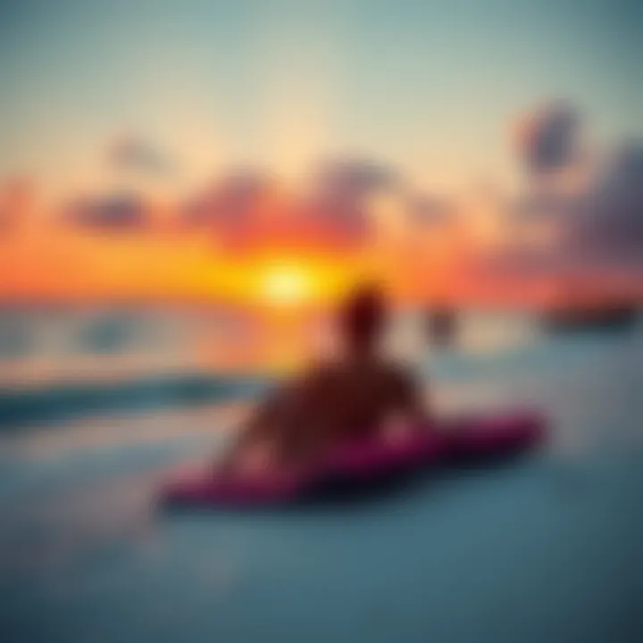 A couple relaxing on a white-sand beach in Zanzibar, watching the sunset over the ocean.